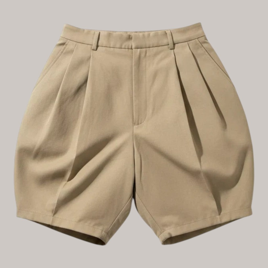 MICHEL beige high-waisted shorts featuring front pleats, side pockets, and a tailored fit in polyester blend fabric.