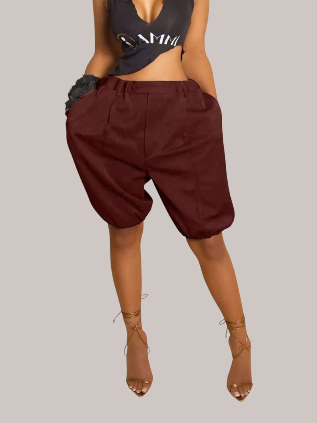 MICHEL high waist pleated shorts in deep burgundy with side pockets and a relaxed fit worn by a model