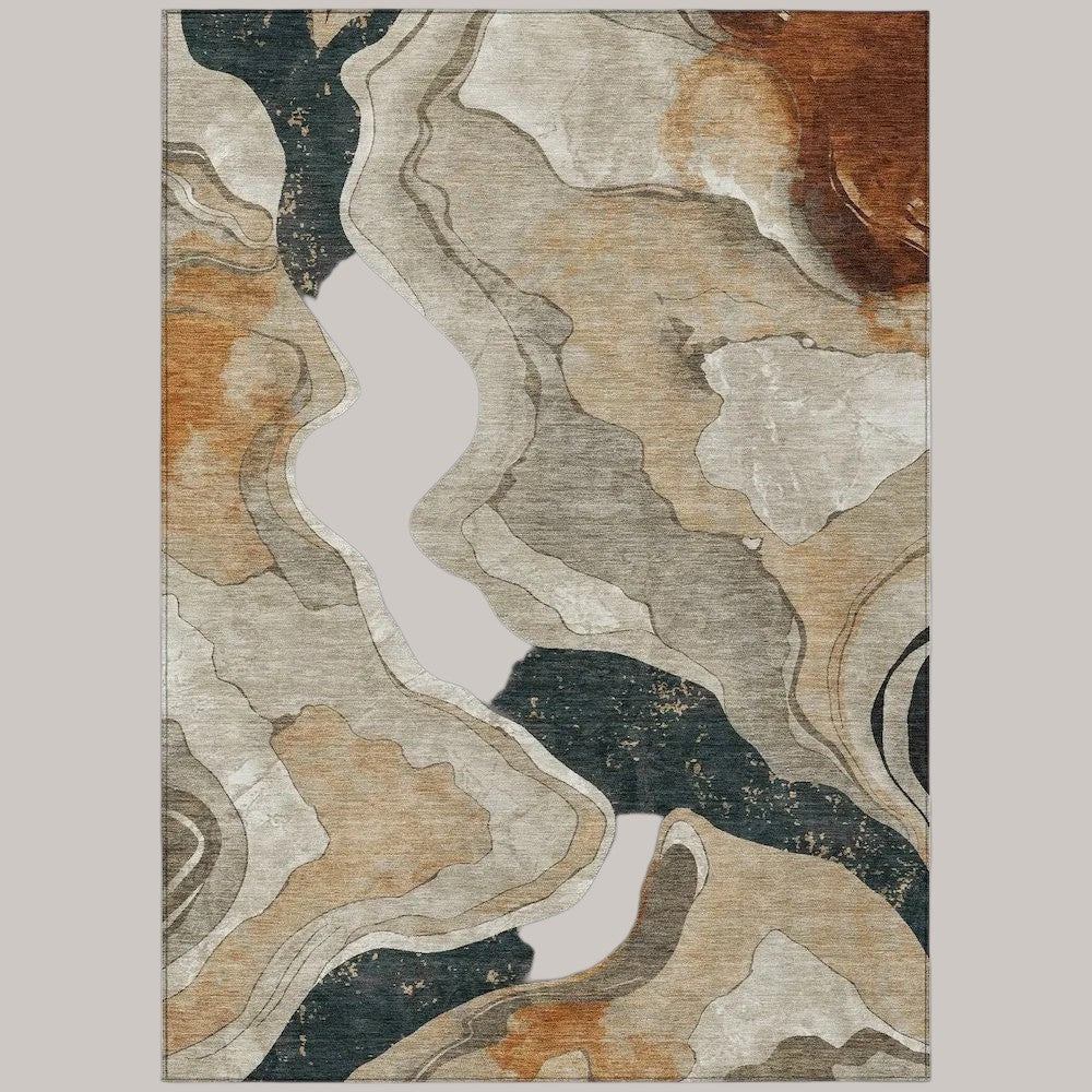 MICHEL Chantille performance area rug with an abstract transitional design in warm putty, brown, and dark grey tones.