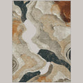 MICHEL Chantille performance area rug with an abstract transitional design in warm putty, brown, and dark grey tones.