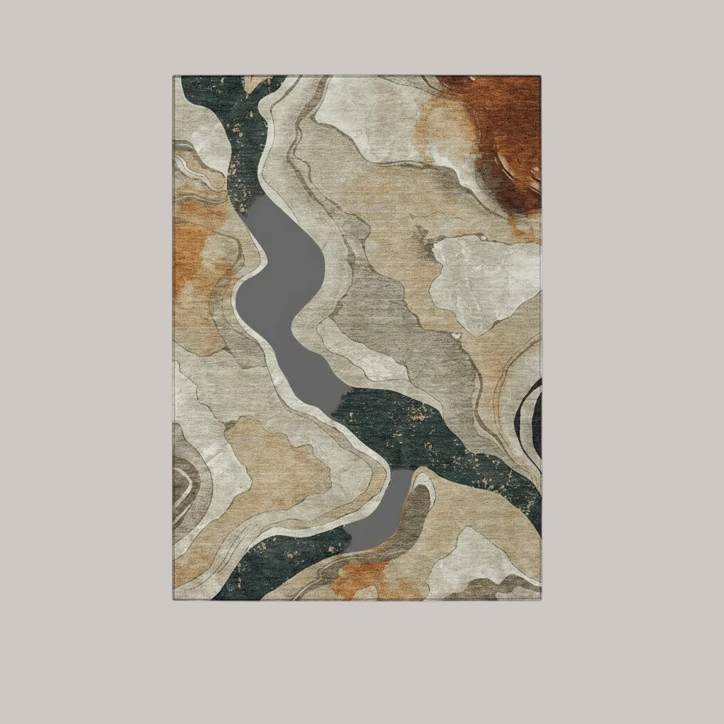 MICHEL Chantille performance area rug with an abstract transitional design in warm putty, brown, and grey tones.