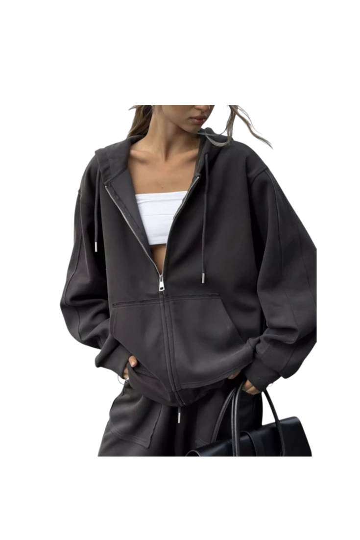 MICHEL oversized charcoal grey zip-up hoodie with drawstring hood and front pockets worn over a white crop top