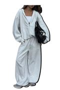 MICHEL two-piece set featuring an oversized grey zip-up hoodie and matching wide-leg drawstring pants with pockets.
