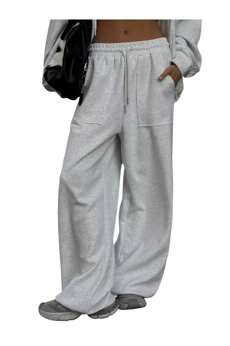 MICHEL light grey oversized wide-leg lounge pants with drawstring waist and front pockets paired with zip-up hoodie