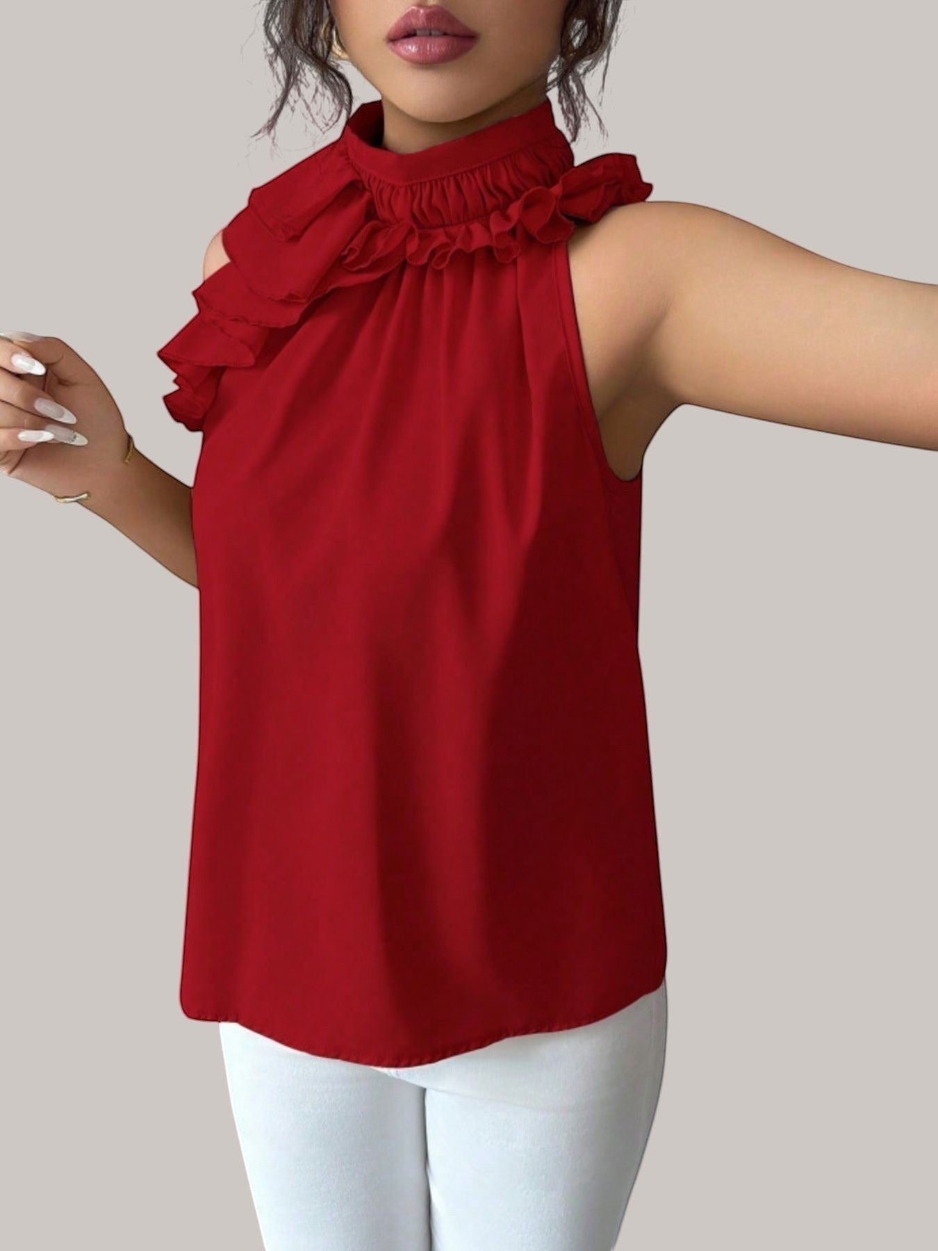 MICHEL red sleeveless high neck top featuring delicate ruffled trim and button detailing in 100% polyester fabric