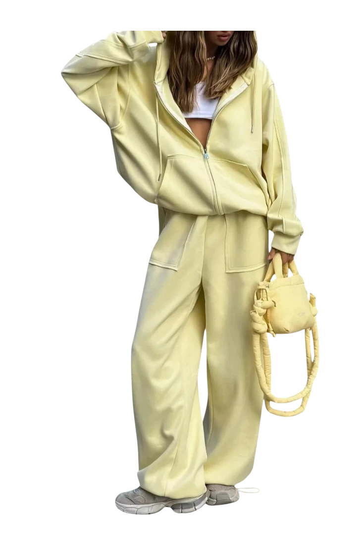 MICHEL oversized pale yellow zip-up hoodie and matching wide-leg pants set with pockets on a model